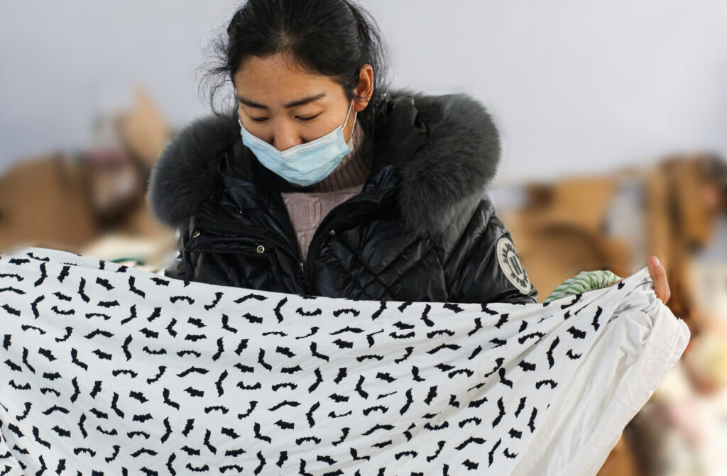 Picking the correct fabric from the warehouse.